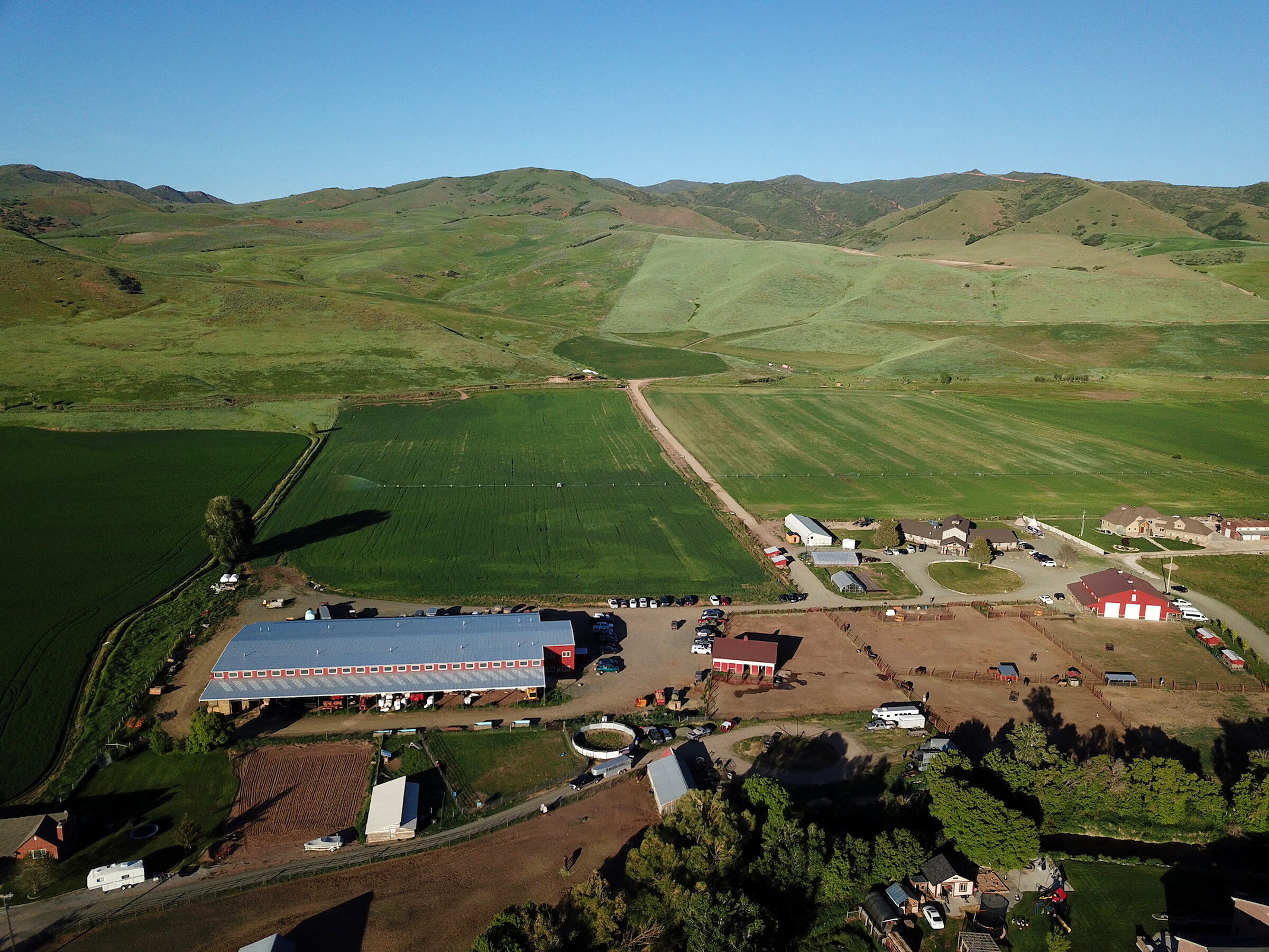 Aerial view of 6,500 acres of ranch land beneath the Wasatch Range